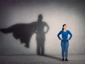 What superhero takes the best photos in the dark?