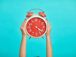 Why did the person sit on the clock?