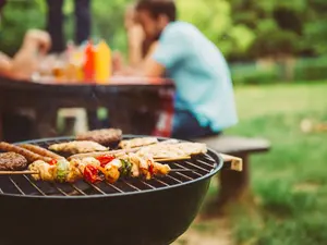 Why is Dad hugging the barbecue?