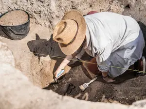 Why was the archaeologist out of a job?